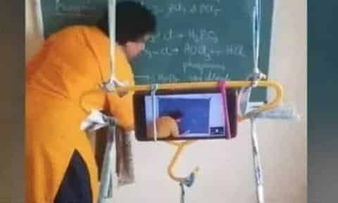 Chemistry Teacher Moumita B Educate Children online by turning her Mobile phone into a Live Camera studio 