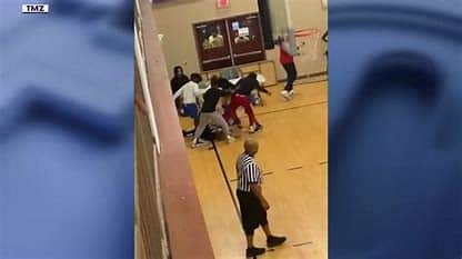 In LITHONIA, Ga. A group of teenage basketball players attacked a basketball official over the weekend inside a church athletic facility, prompting an investigation by the police.