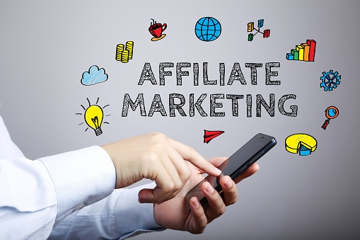 Affiliate Marketing business concept with businessmen touching the smartphone.