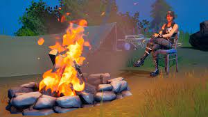 Fortnite a Lit campfire at night - Where to dance at Lit Campfire in Fortnite chapter 3 season 4