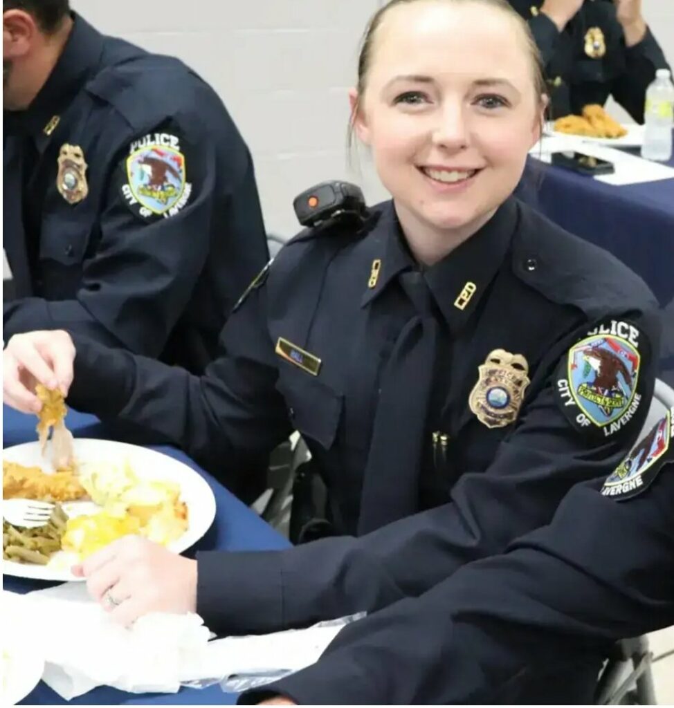 Police officer Megan hall who has been fired for allowing several police officers run train on her.