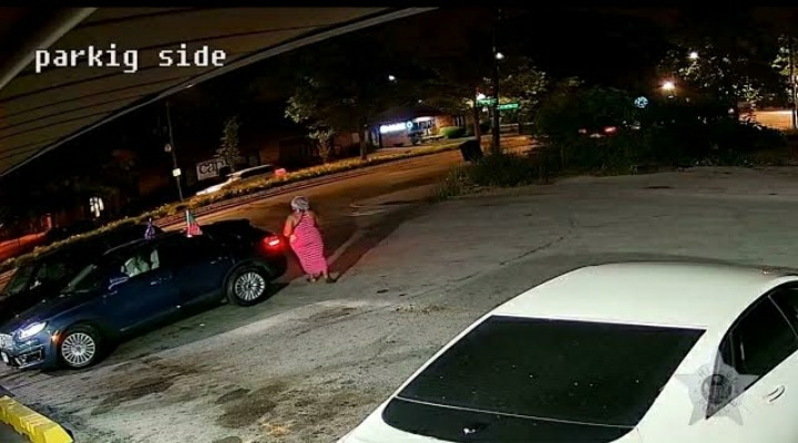 Photo shows Carlisha Hood approaches the car amd tells her son about the Jeremy Brown beating her